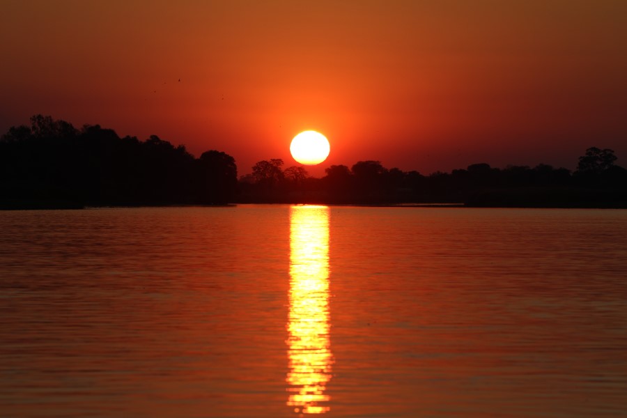 Sonnenuntergang am Okavango